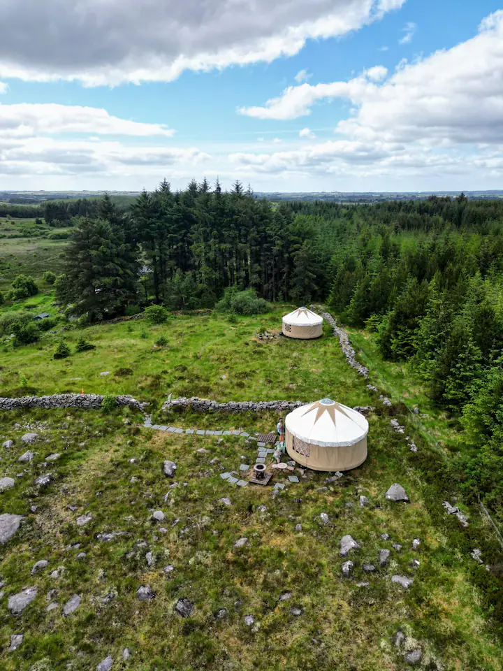 a2215ee2-8515-48cf-9872-a766e5442932 Yurt lit from within at night