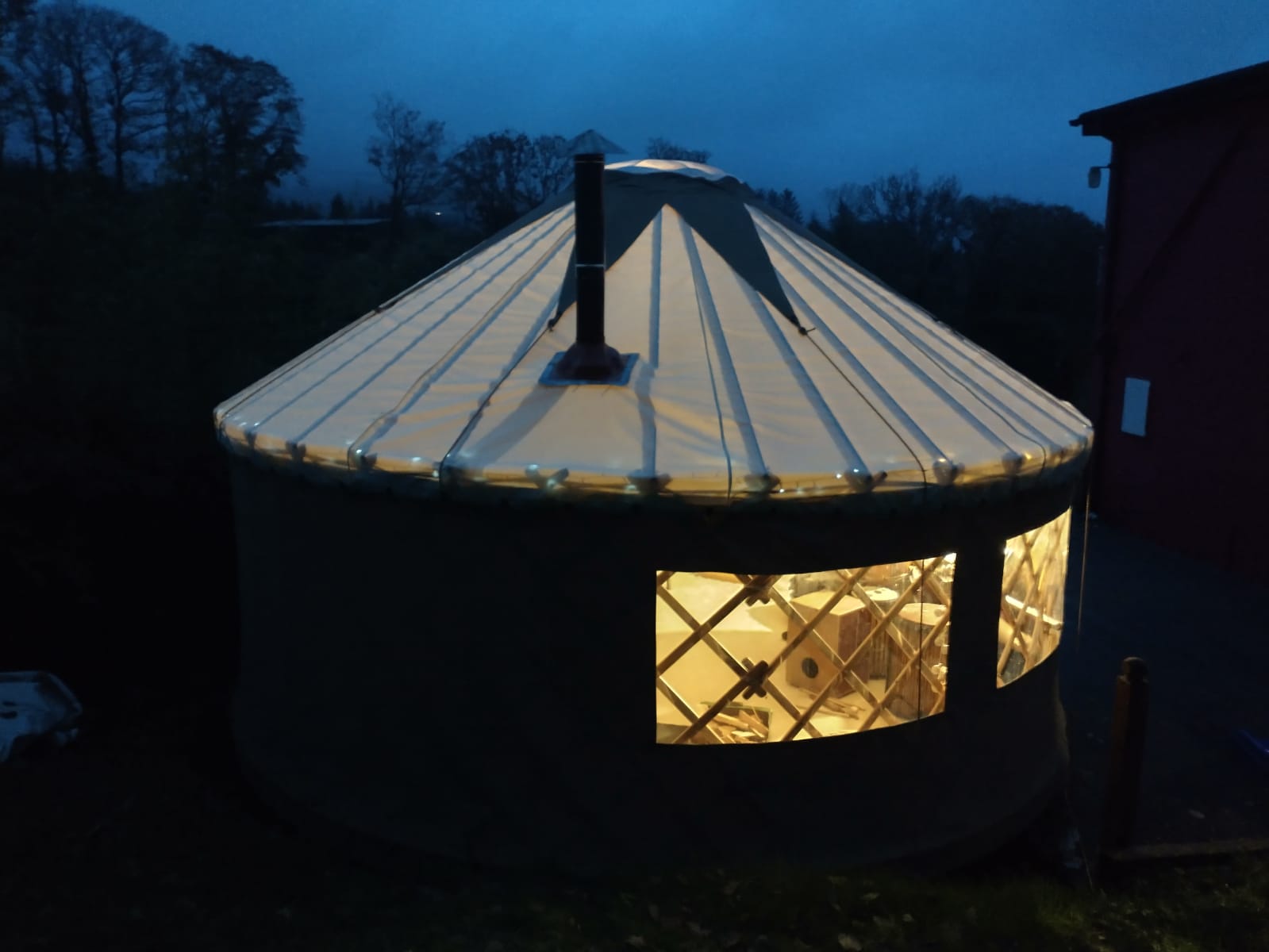Yurt lit warmly in the evening