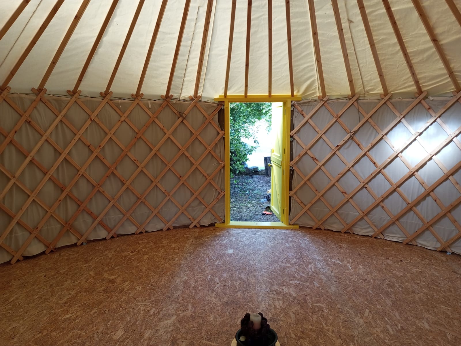 Inside a small treatment yurt
