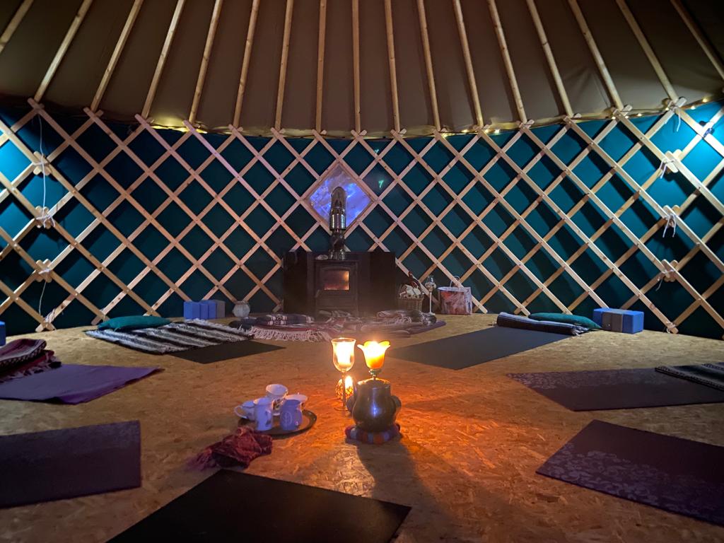 Yurt lit from inside at dusk